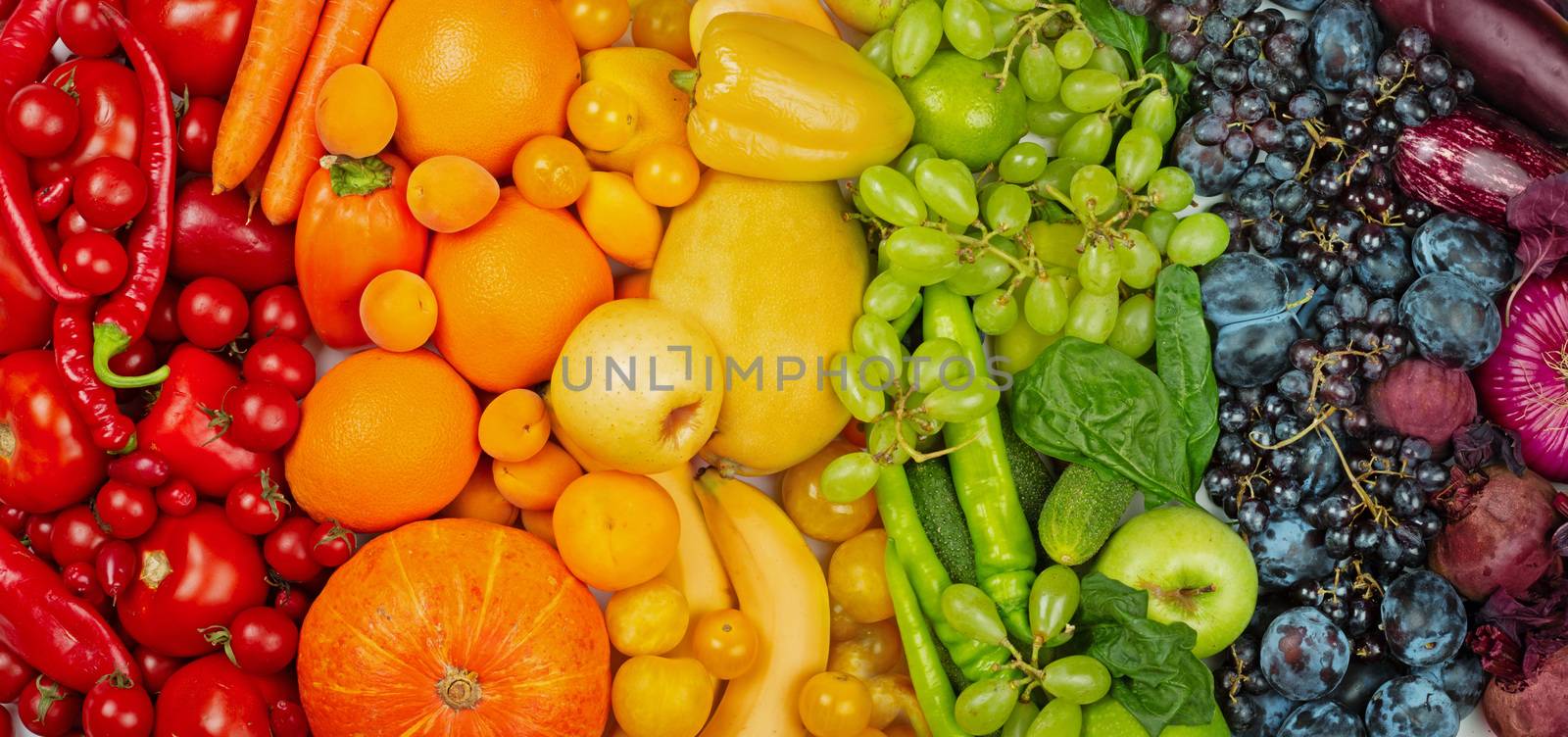 Rainbow fruit and vegetable background by destillat