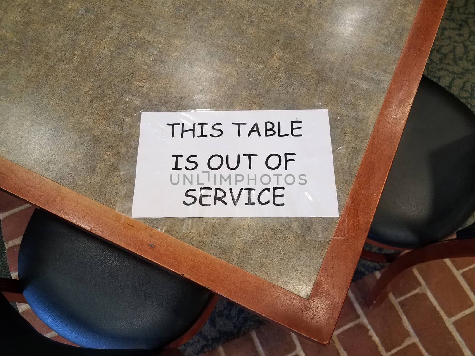 paper this table is out of service sign on table