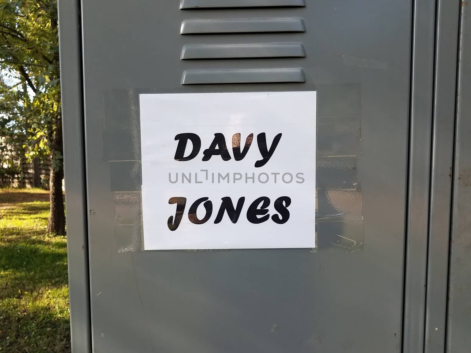 davy jones locker sign on grey metal locker