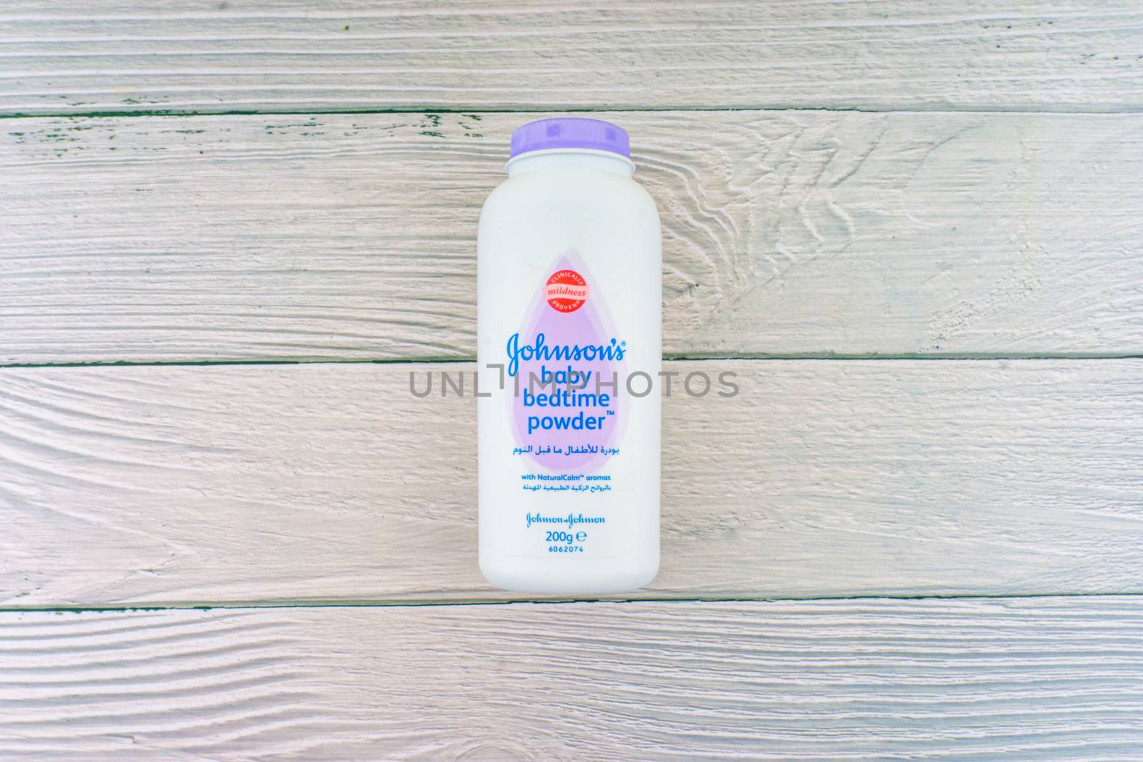 Kuala Lumpur, Malaysia - October 19, 2020 : Johnson and Johnson Baby bedtime powder talcum on wooden background