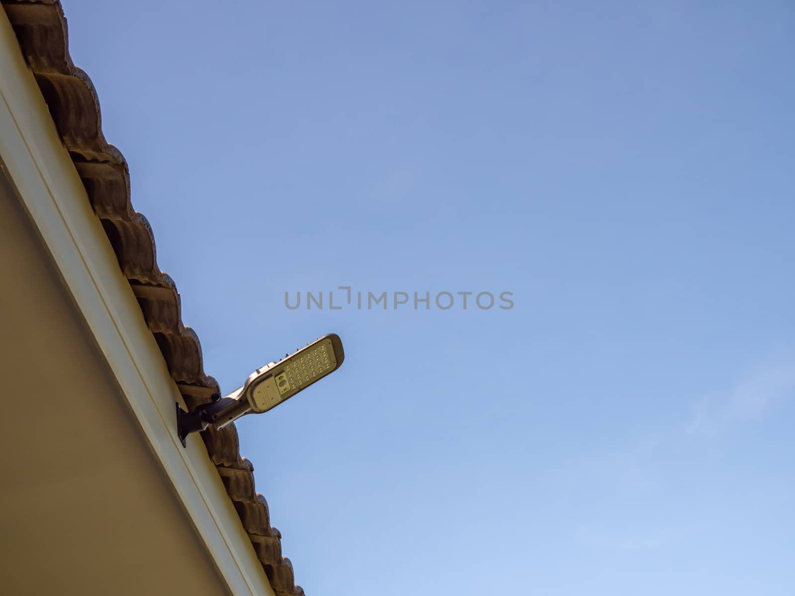 Lamps on the roof used green power from the photovoltaics. concept of green energy generation for environmental .
