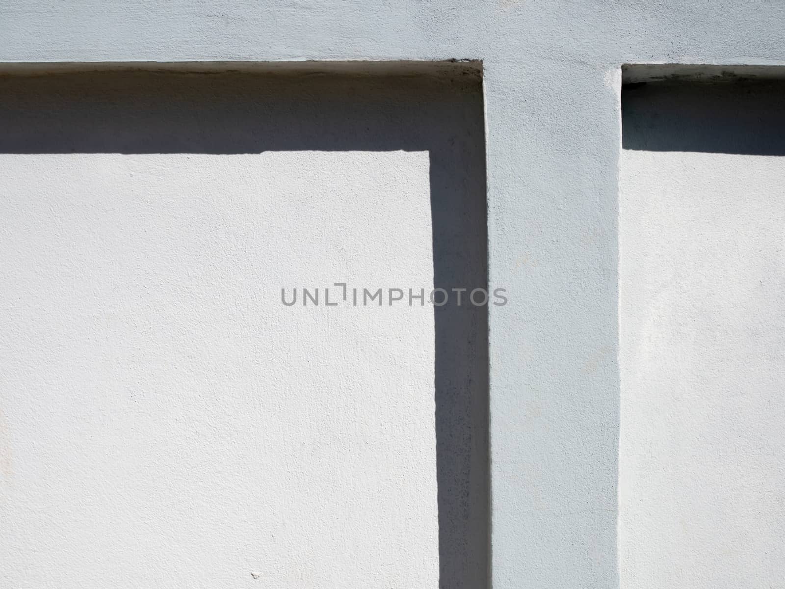 White cement wall fence empty There are light and shadow contras by Unimages2527