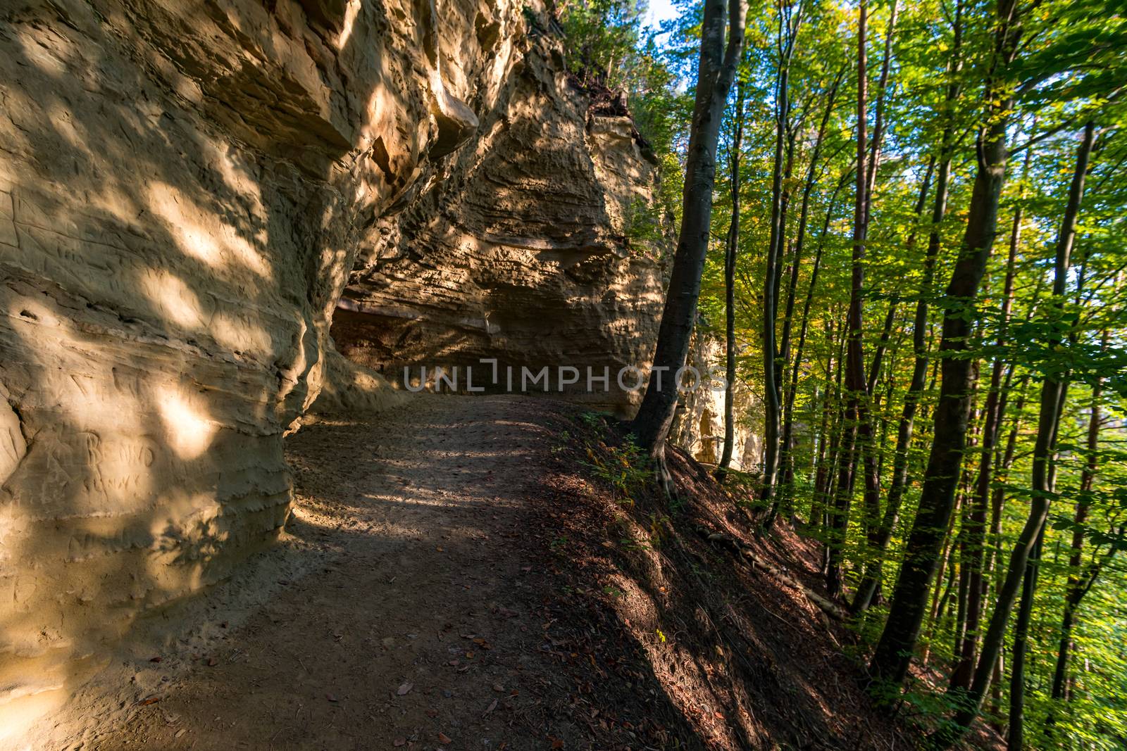 Leisurely hike at the golden hour to the famous Heidenhoehlen near Stockach on Lake Constance