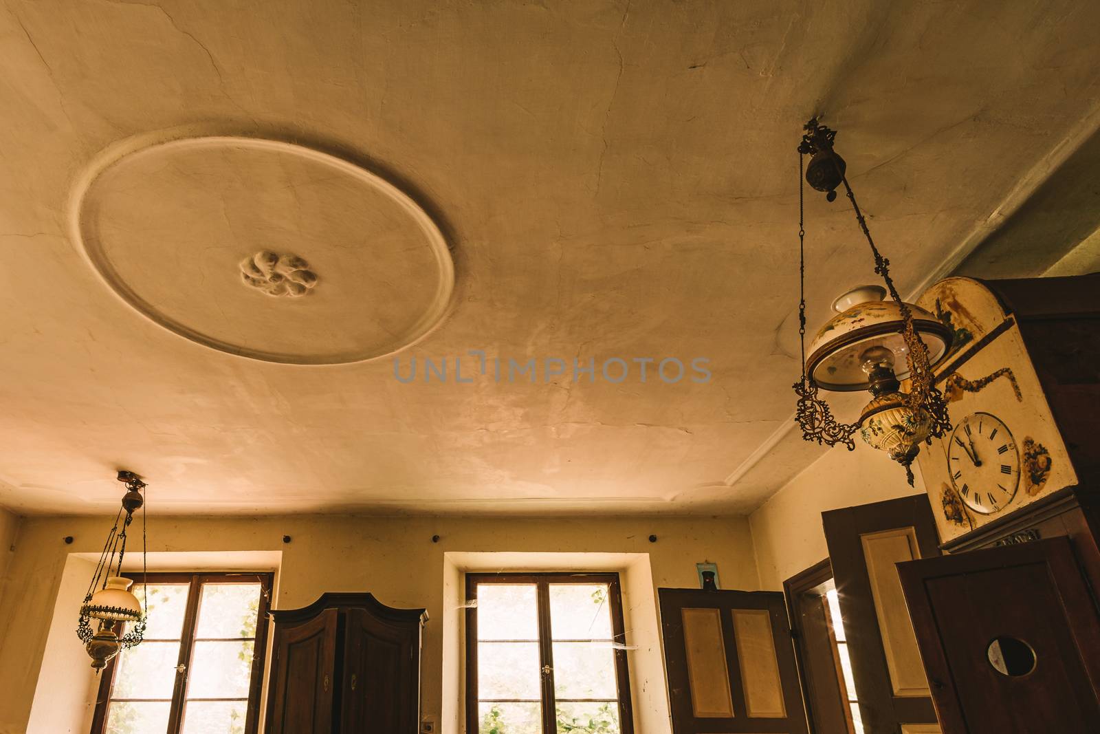 An old abandoned manor house with antique furniture and wonderful architecture by mindscapephotos