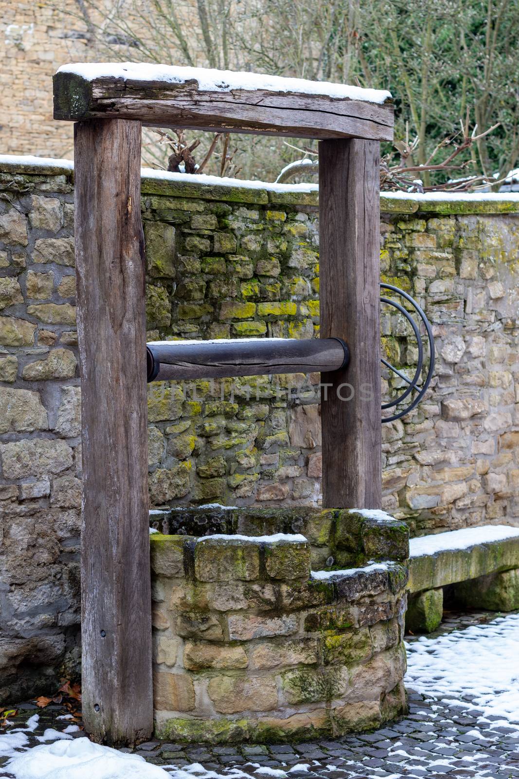 Historic water supply well in the old town of Meisenheim by reinerc