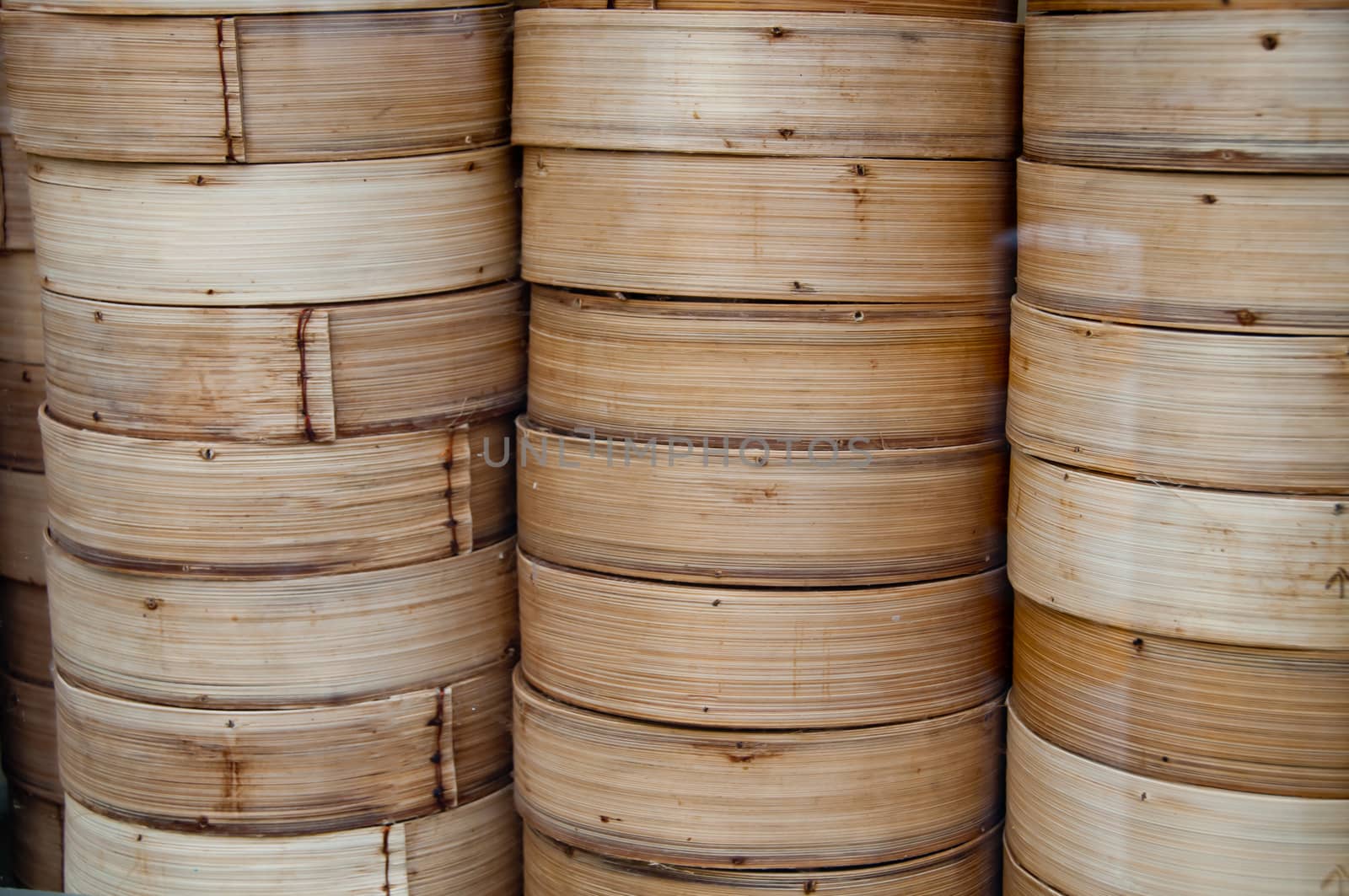 Bamboo dim sum yum cha wooden containers laid in stack