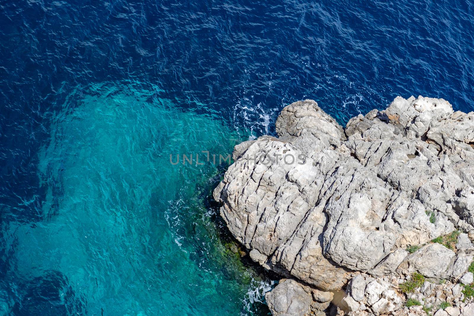 Bay on the peninsula La Victoria, Mallorca with rock in the water and rocky coastline