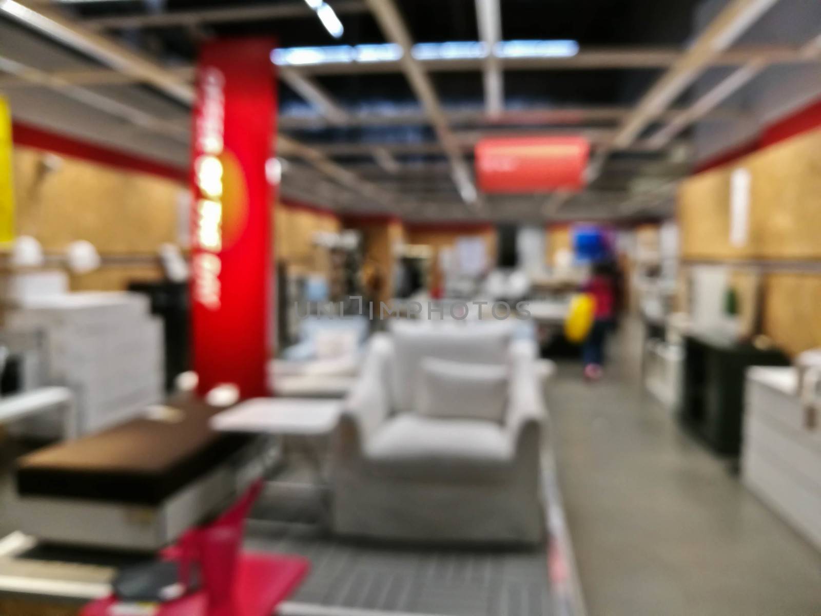 Defocused blurry scene of a self service furniture warehouse sho by eyeofpaul