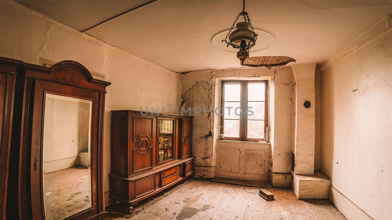 An old abandoned manor house with antique furniture and wonderful architecture by mindscapephotos