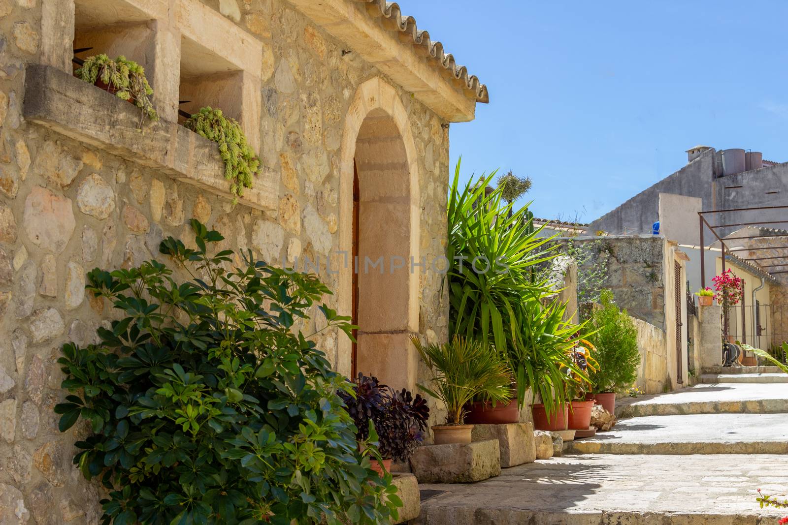 Small road and house in the village Campanet in the north of Mallorca