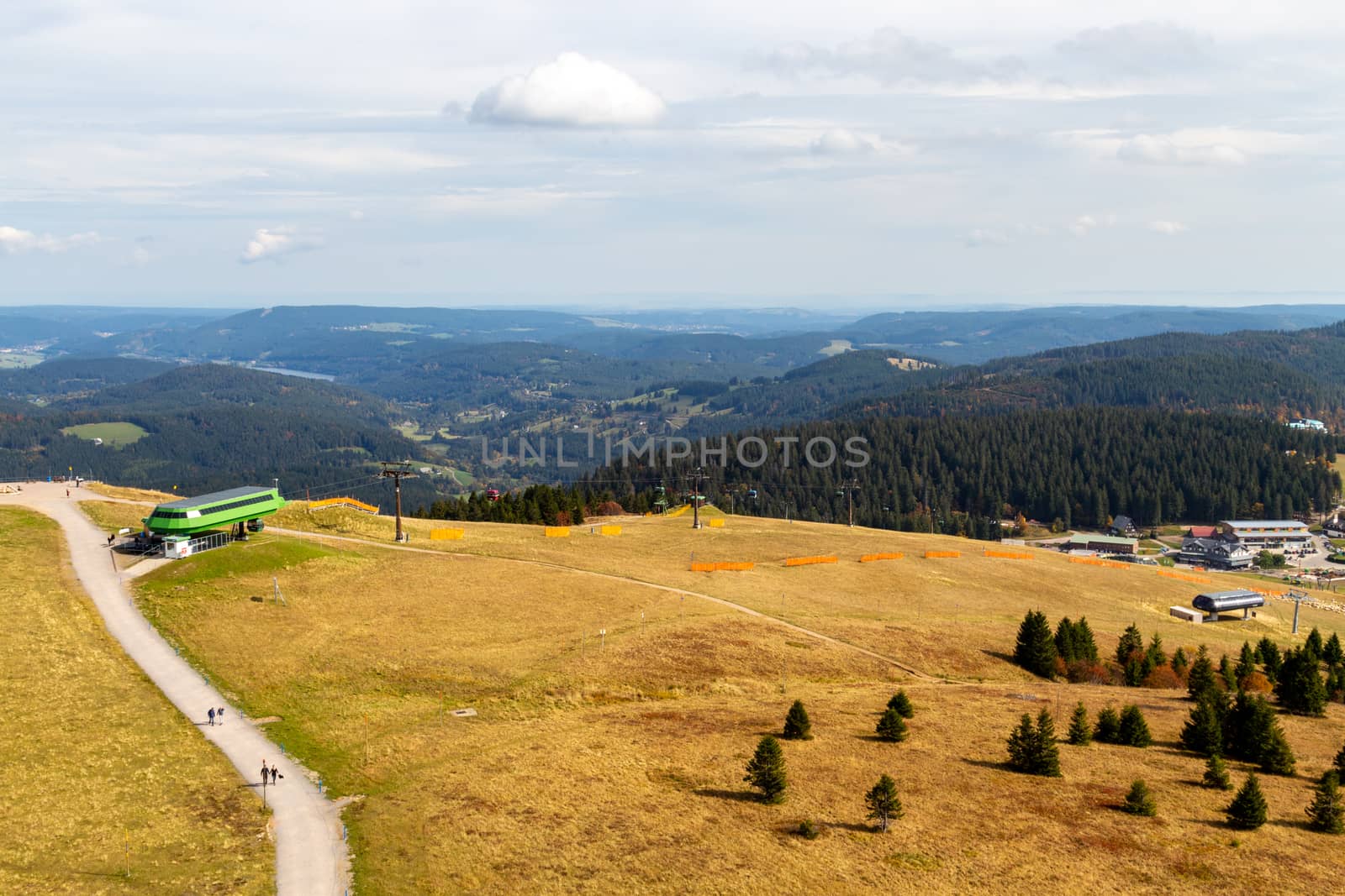 Scenic view from Feldberg tower at landscape of Black Forest, Germany in autumn with multi colored trees