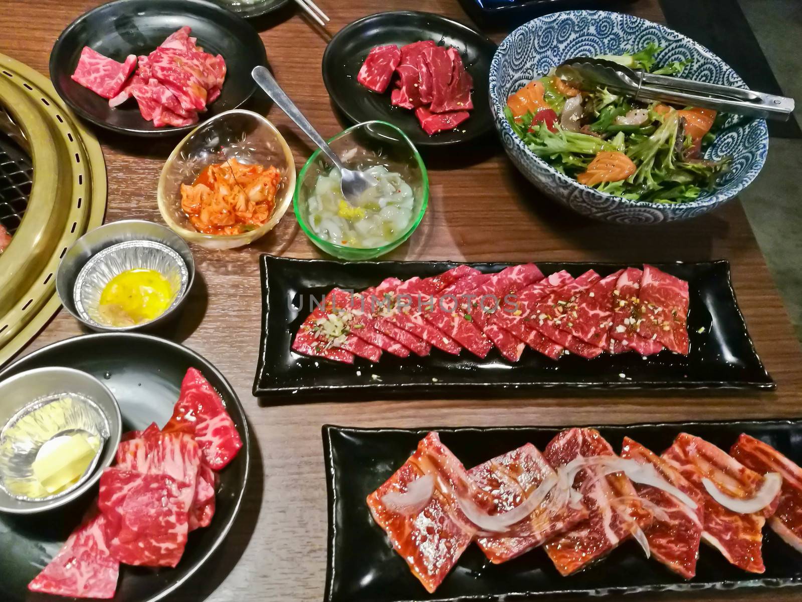 Various premium Japanese Wagyu marbling grilled beef yakiniku fire pot in Tokyo Japan