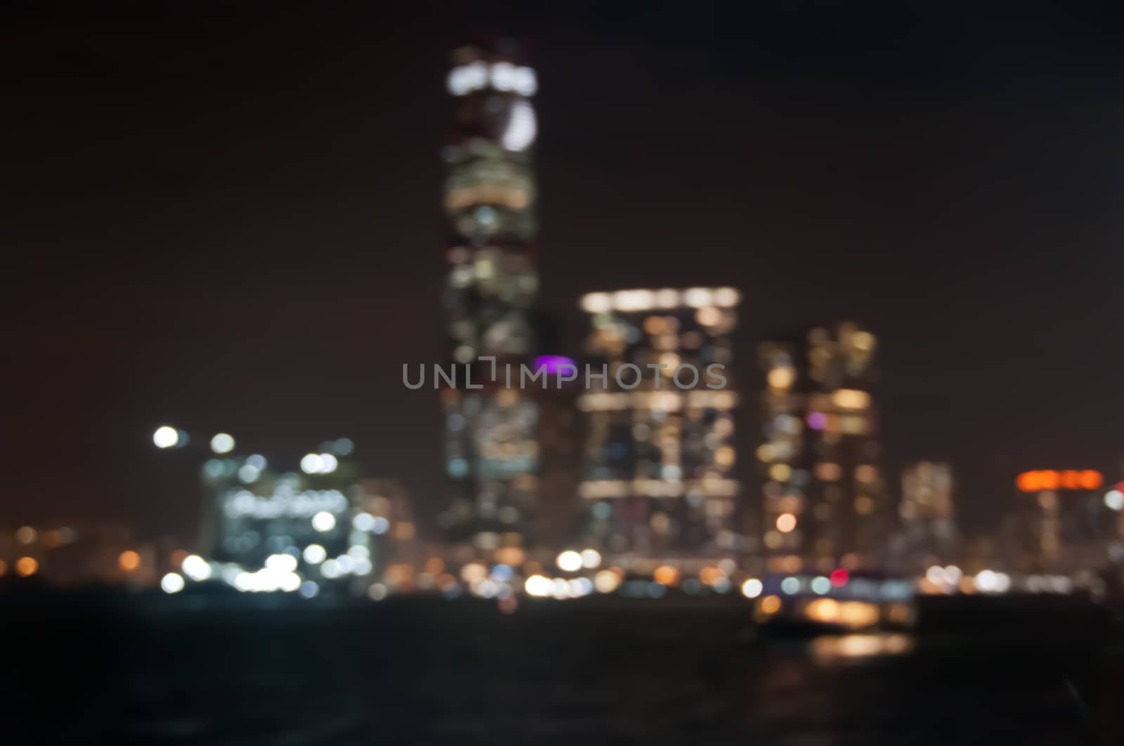 Defocused dark blurry scene of skyscrapers commecial towers in Hong Kong near Victoria Bay by eyeofpaul