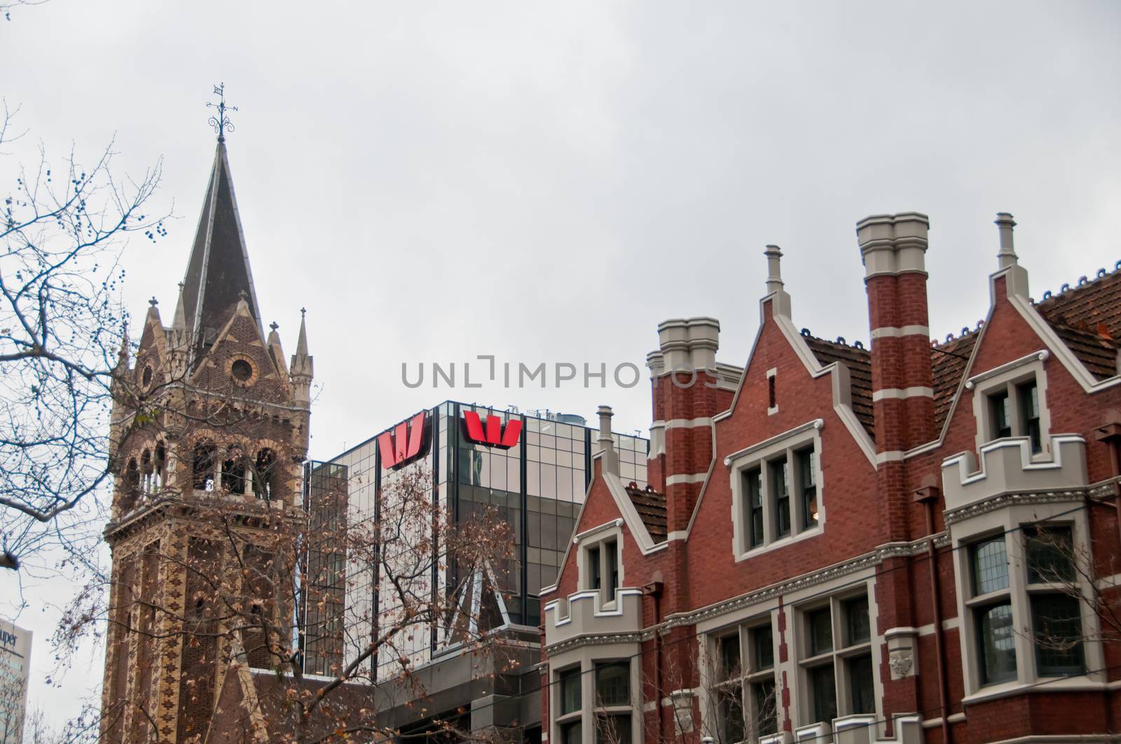 MELBOURNE, AUSTRALIA - JULY 26, 2018: Scots' Church and Westpac bank tower at a corner of Russel St and Collins St in Melbourne Australia