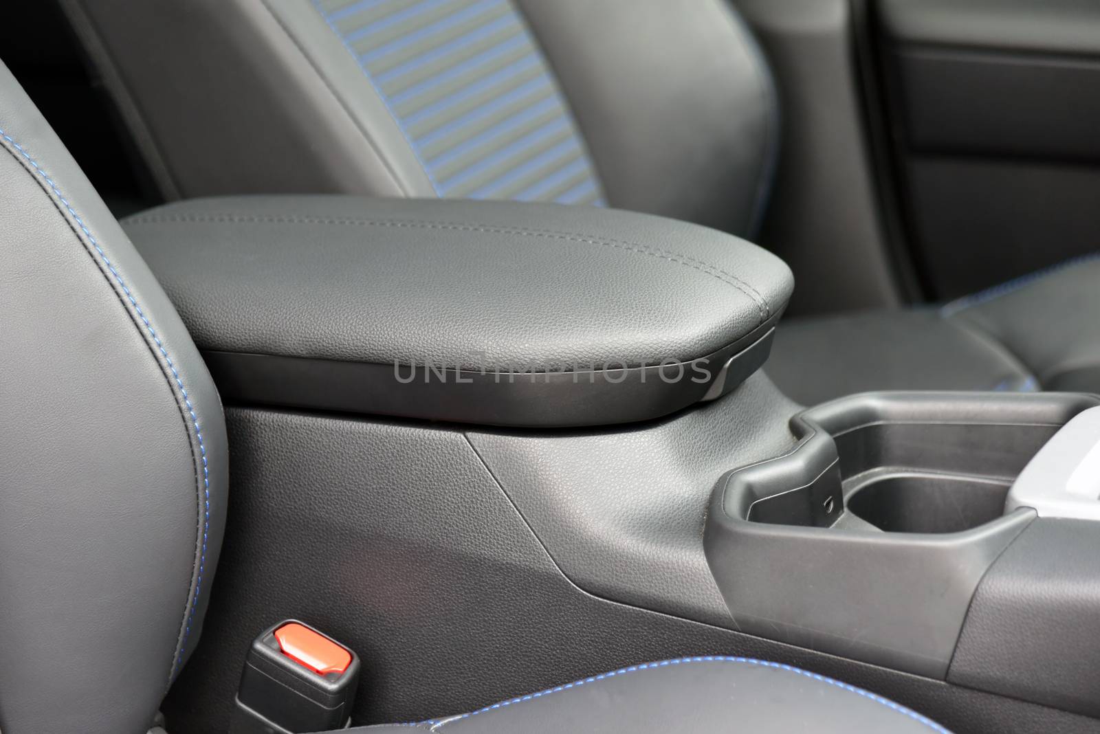 Armrest in the car. Detail in the interior of the modern car.