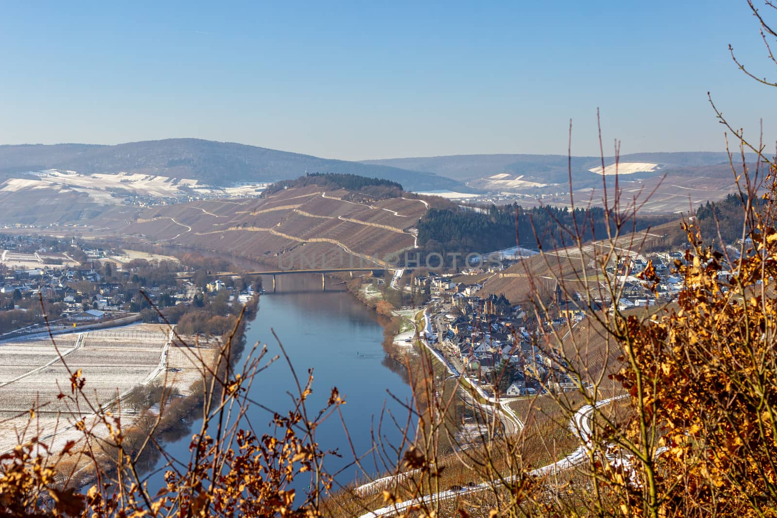 View on the valley of the river Moselle, Germany in winter with snow