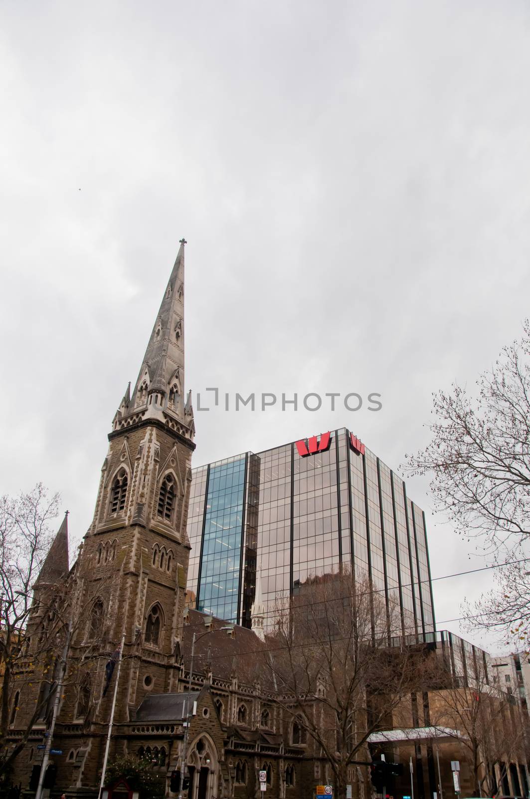 MELBOURNE, AUSTRALIA - JULY 26, 2018: Scots' Church and Westpac bank tower at a corner of Russel St and Collins St in Melbourne Australia