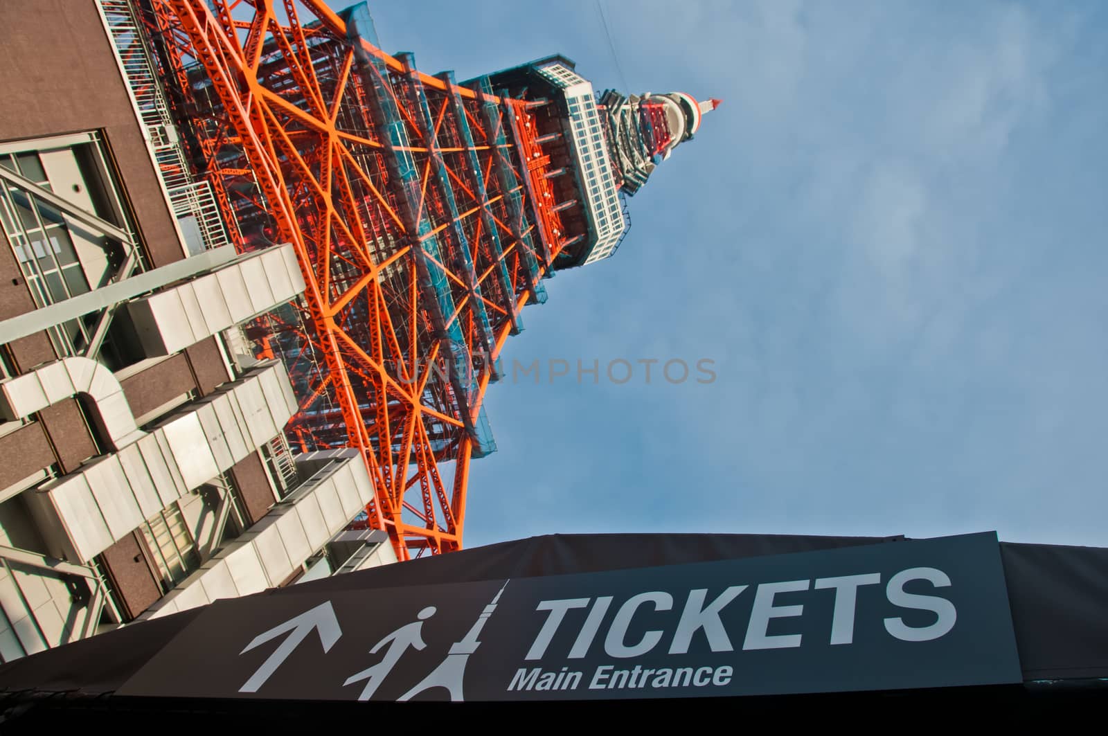 TOKYO, JAPAN - DECEMBER 1, 2018: Main entrance to buy tickets of famous Tokyo Tower situates in the central Tokyo in the morning. The tower is a communications and observation tower with around 330 metres tall and was built in 1958. There is nobody in the photo.