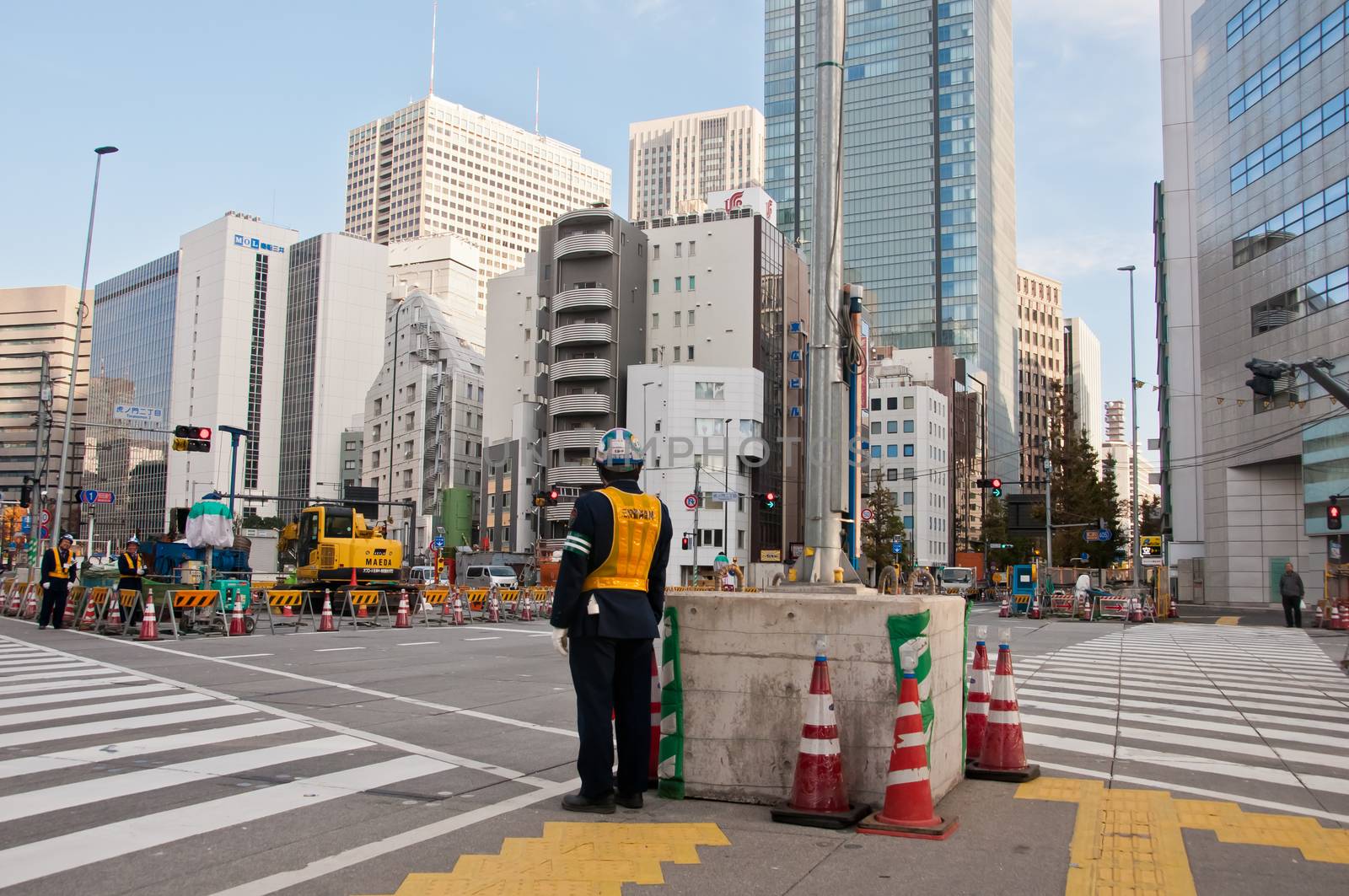 TOKYO, JAPAN - DECEMBER 1, 2018:  Japanese construction workers  by eyeofpaul