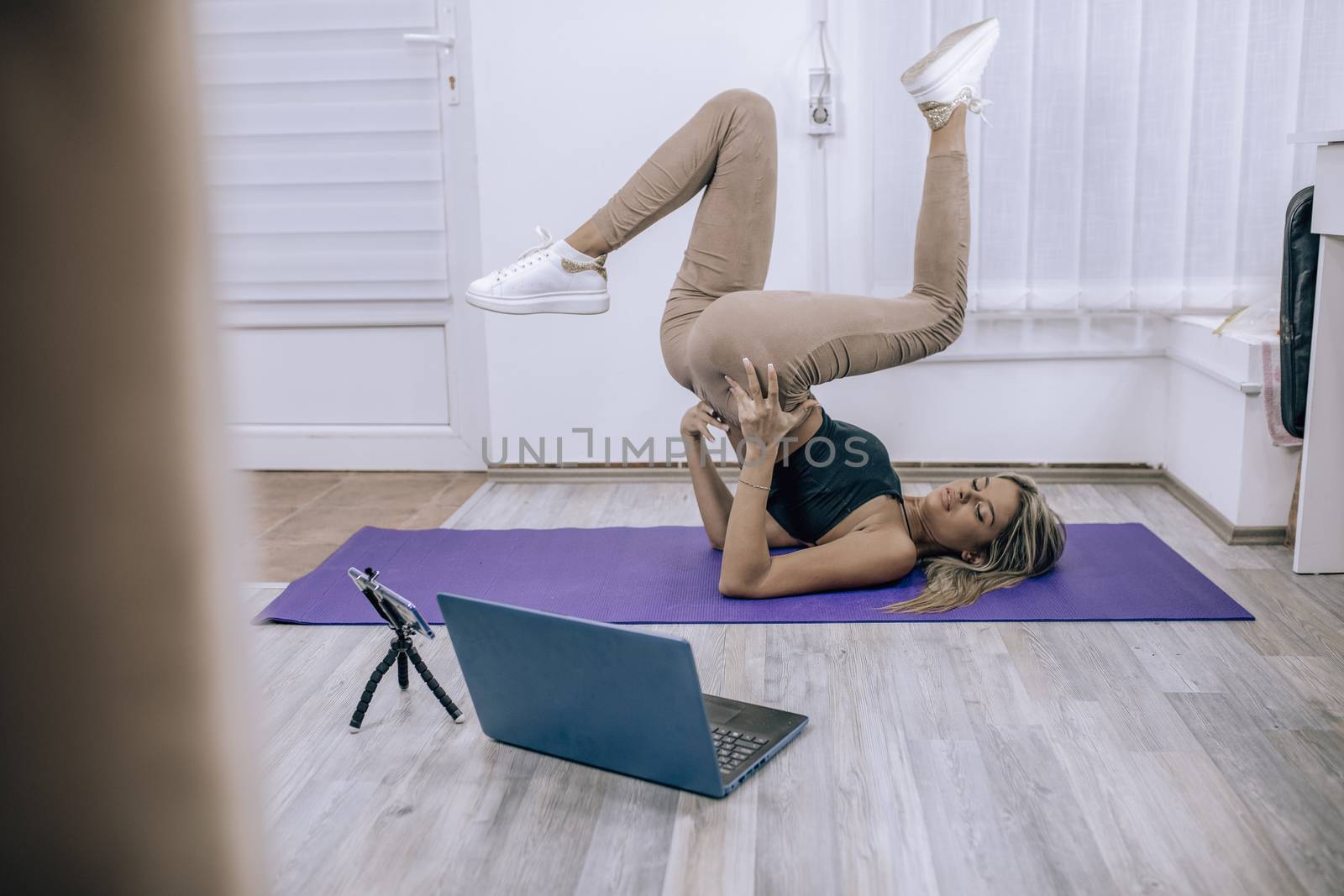 Fitness Yoga coaching working from home - Personal training online stock photo