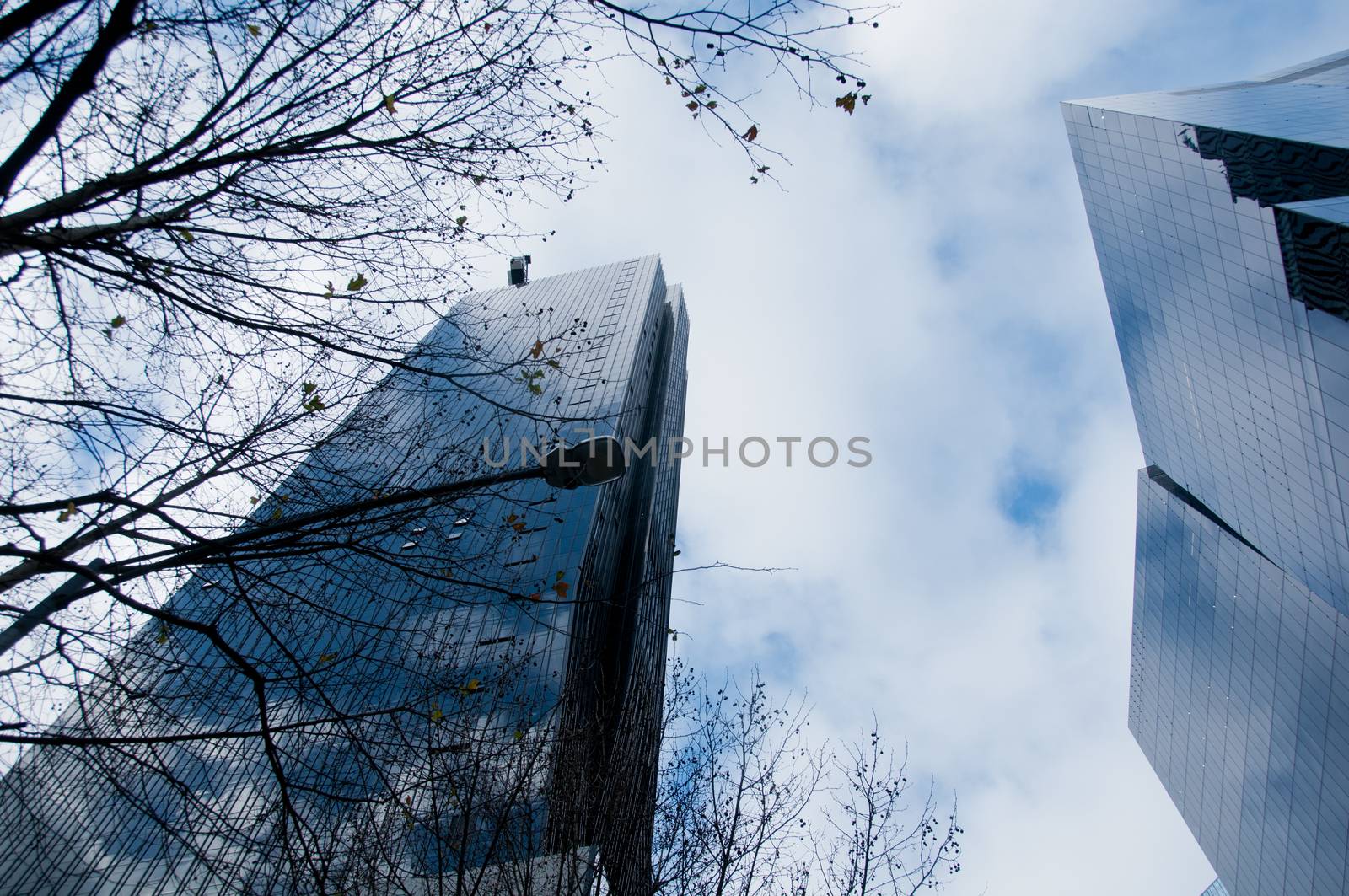 Modern trendy business corporation office with blue glass in Win by eyeofpaul