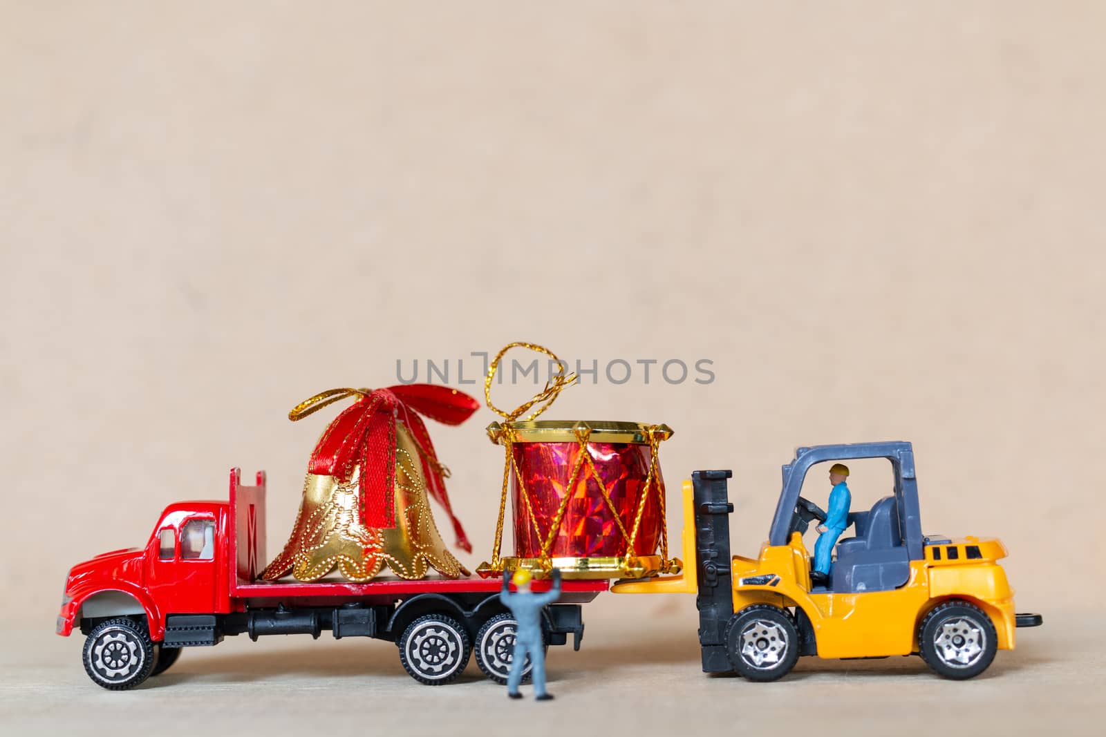 Miniature people,  Worker team working with a Christmas decorati by sirichaiyaymicro