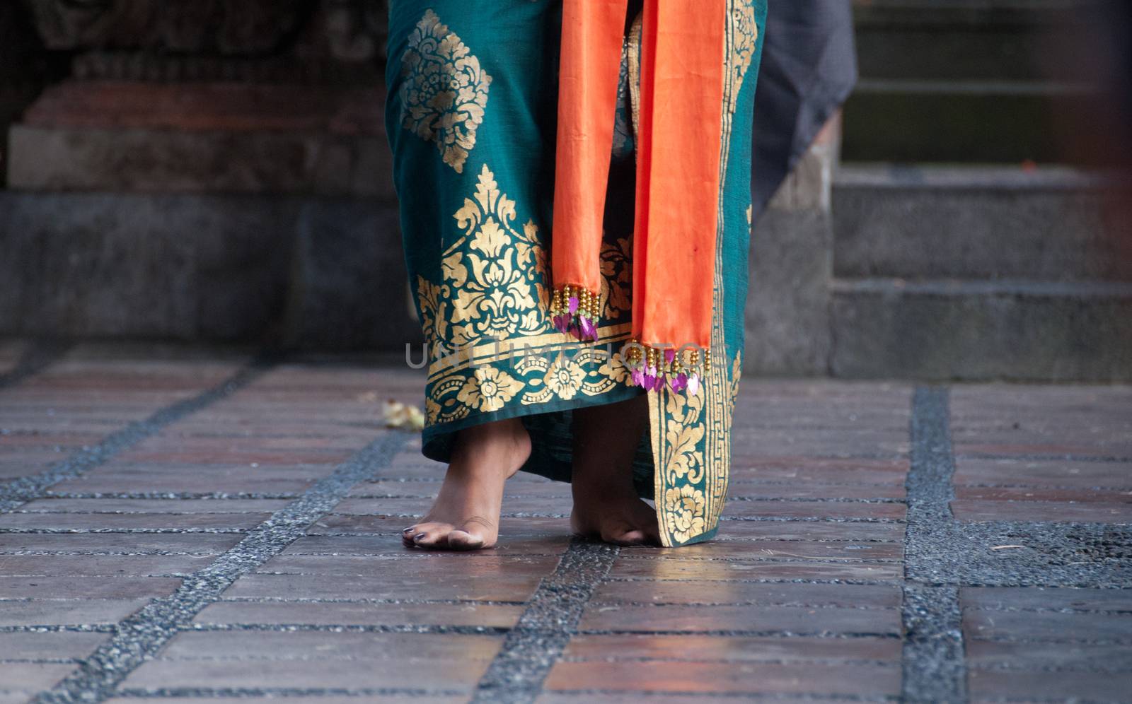 Feet of traditional Bali dancer in Barong performance by eyeofpaul