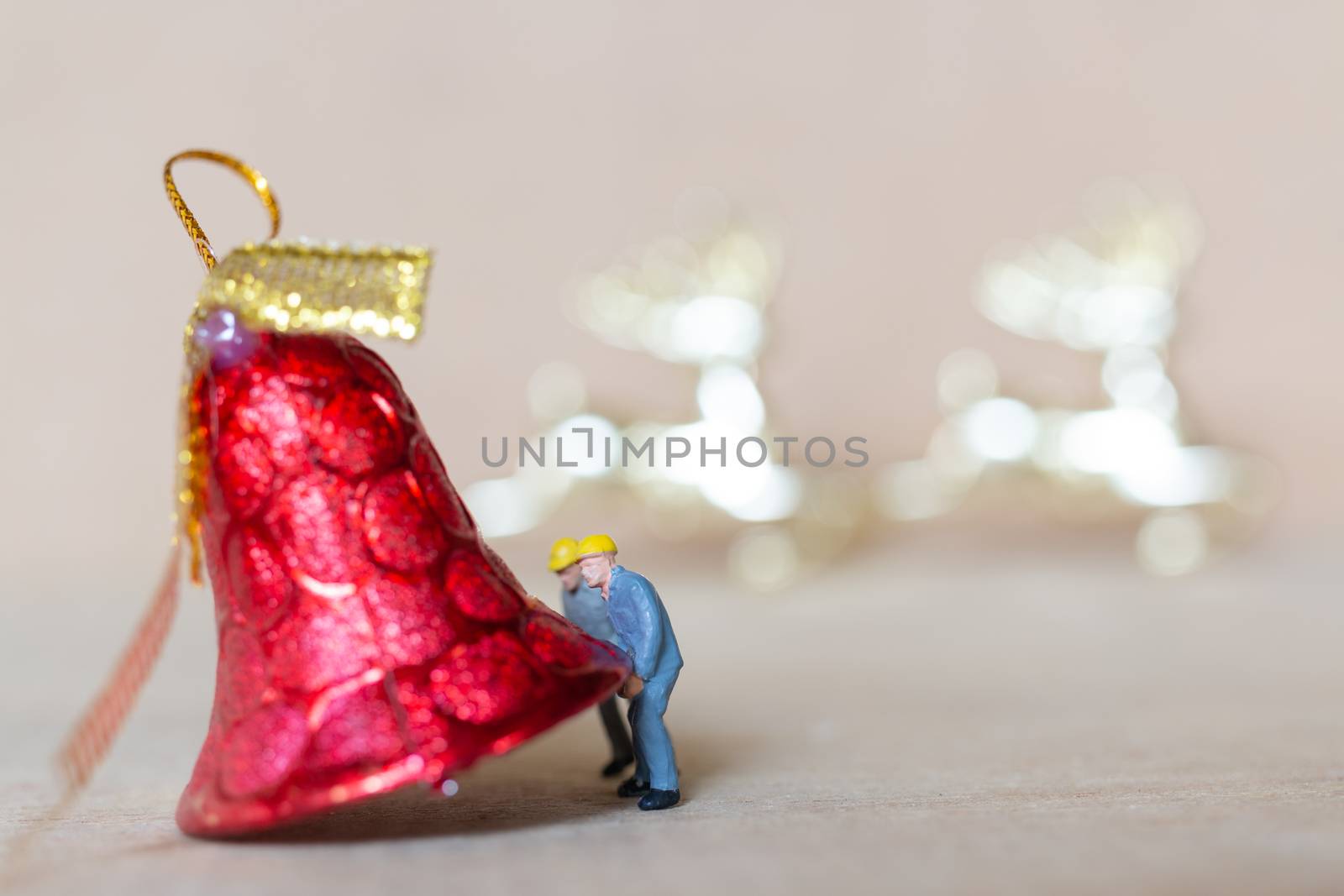 Miniature people,  Worker team working with a Christmas decoration , Christmas and Happy New Year concept.