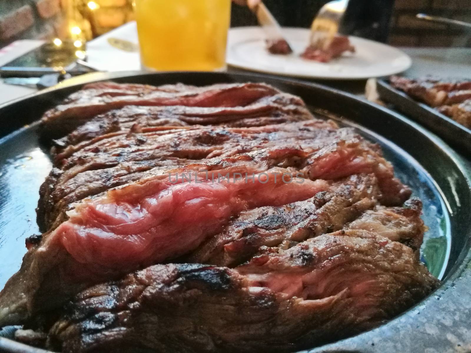 Medium soft chewey Wagyu rump steak served on hot plate