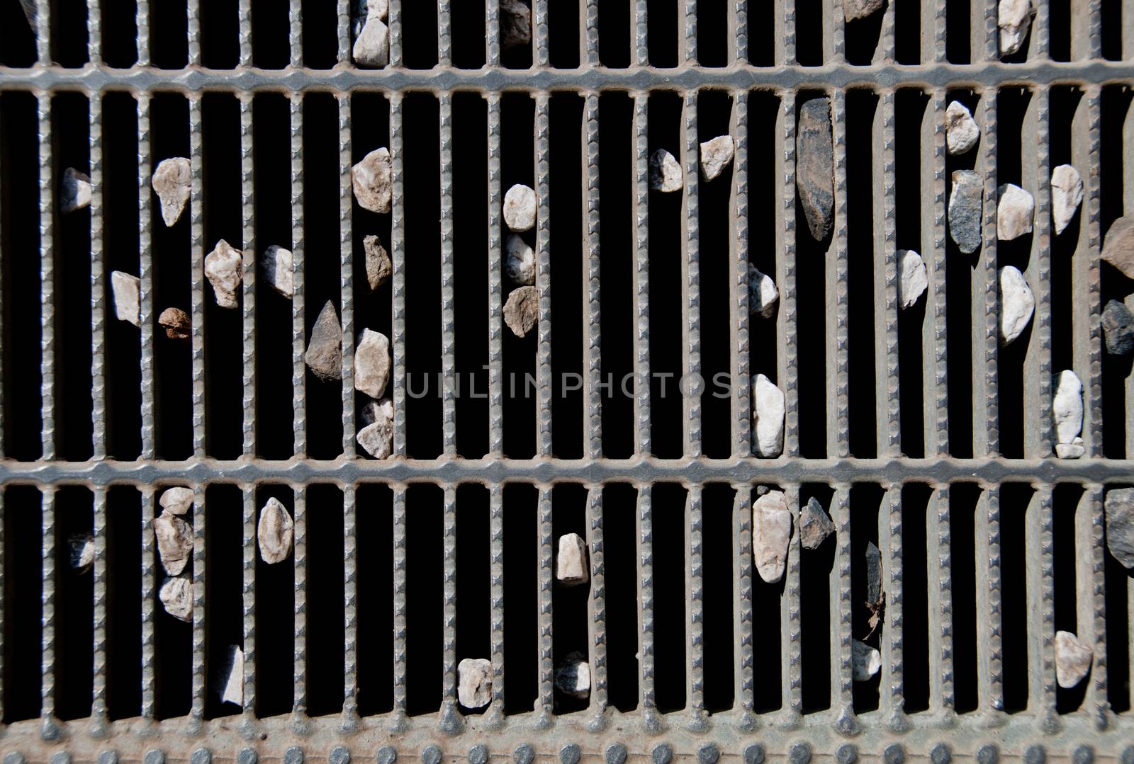 Small stones struck in holes of water filter floor floor by eyeofpaul