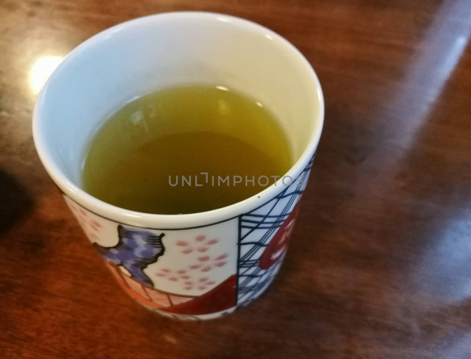 Japanese matcha strong green tea on wooden table