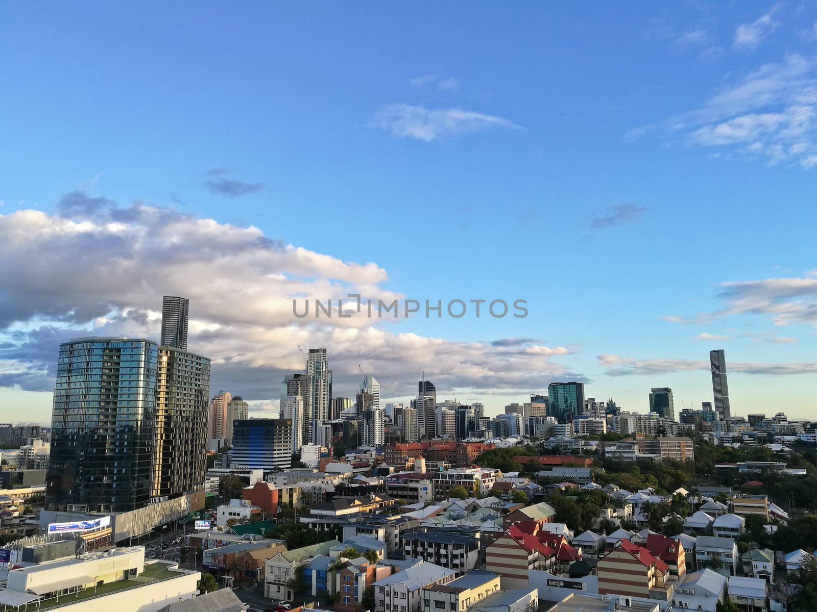 Calm evening blue sky scene with Brisbane skyscraper view by eyeofpaul