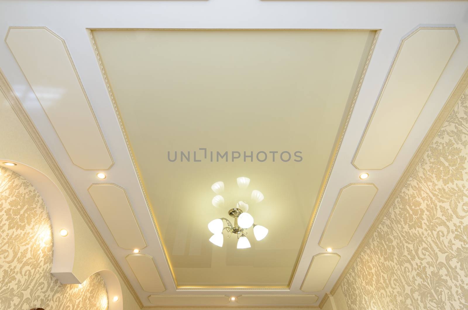 Beautiful original rich multi-level stretch ceiling in the interior of the room