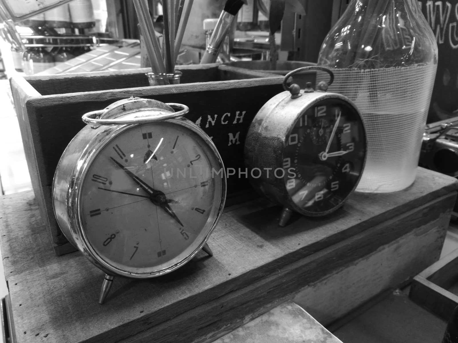 Vintage classical desk clocks in black and white photo by eyeofpaul