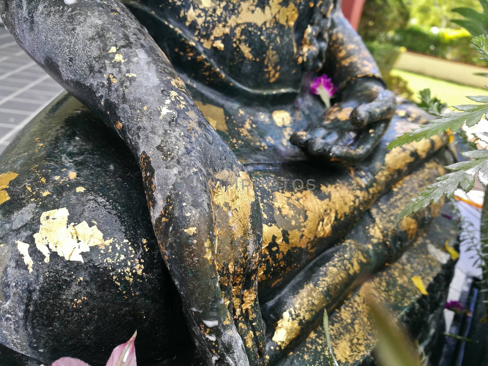 Close up of mercy Buddha hand sculpture in Asian temple