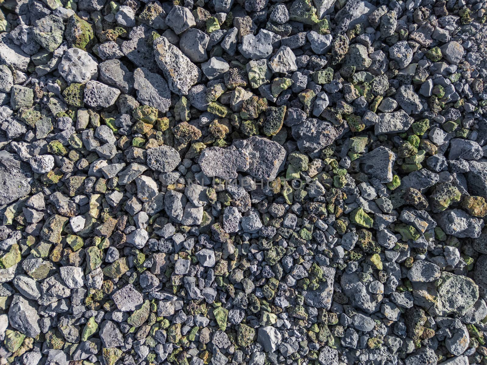 gray and green metallurgical slag macadam stone bedding - full frame background and texture.