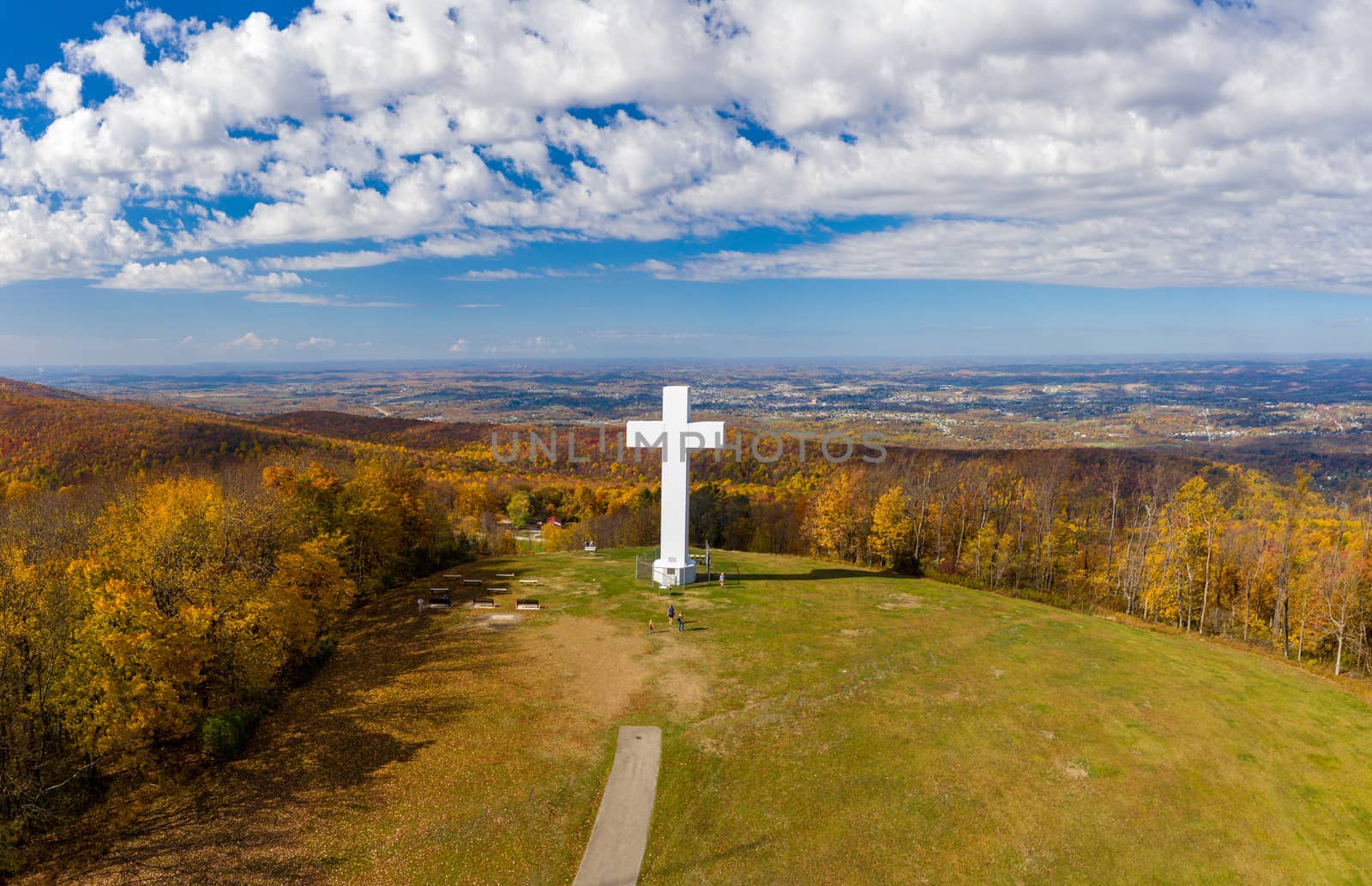 Aerial drone view of the metal structure of the Great Cross of Christ on Dunbar's Knob in Jumonville, PA