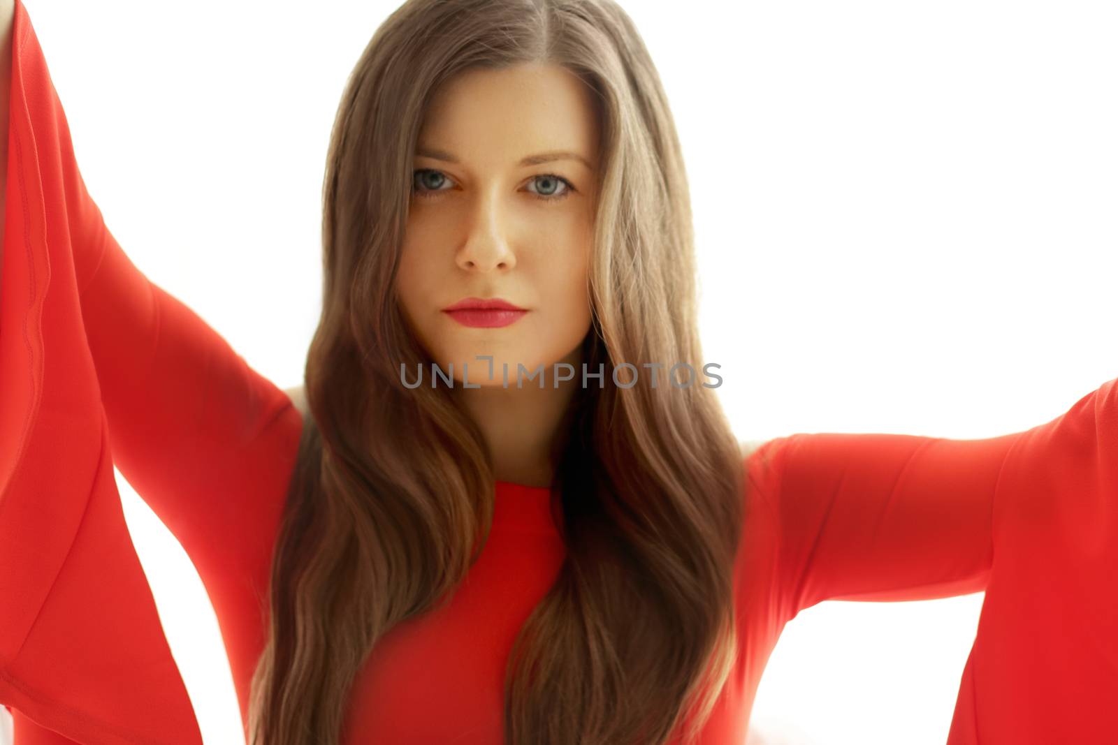 Beautiful model woman wearing red dress and bright lipstick, bru by Anneleven