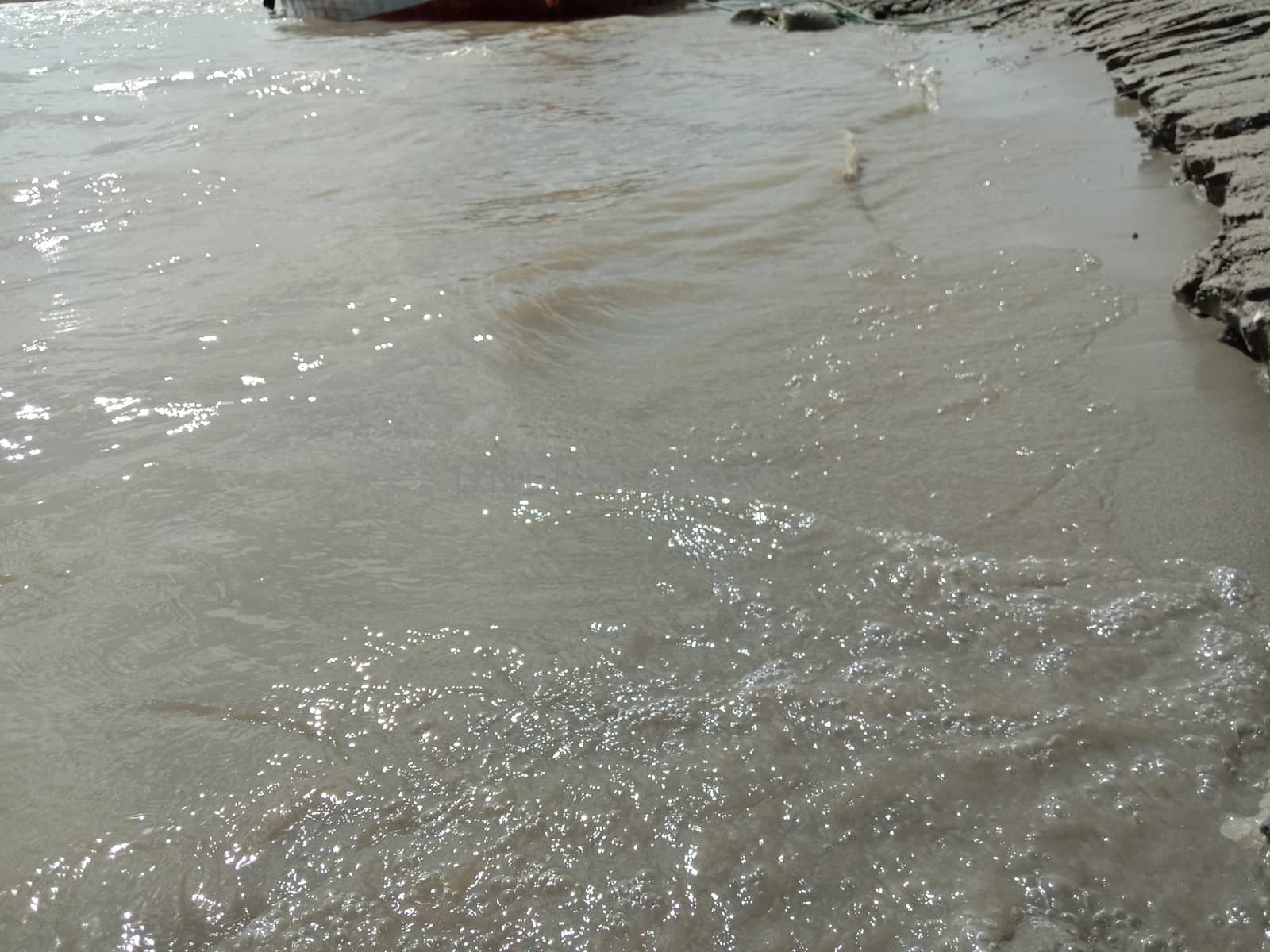 sand and water wave view in river