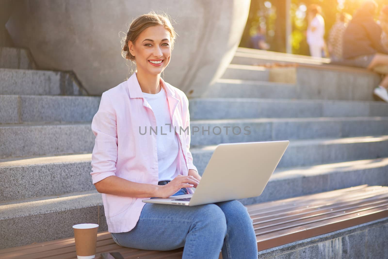 Businesswoman sitting stairs summer park using laptop Business persone working remote. Outdoor Successful european caucasian woman freelancer make video call teacher study work online lessons