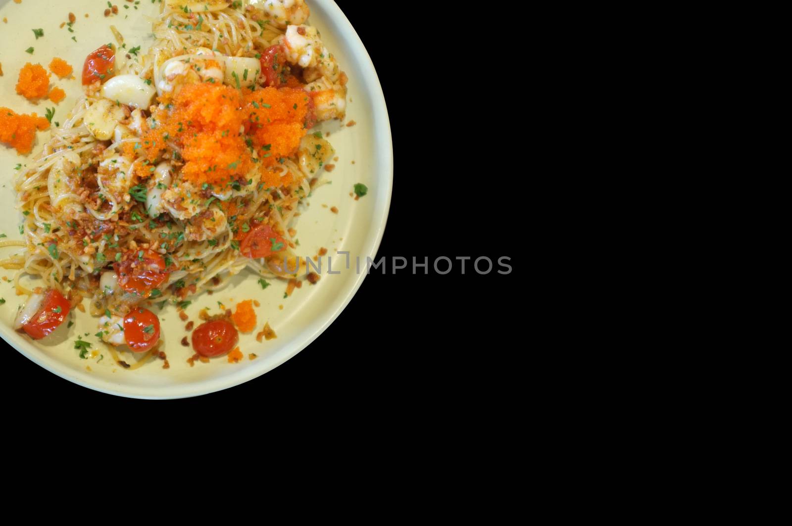 fusion food style , Cream sauce spaghetti egg shrimp on black background