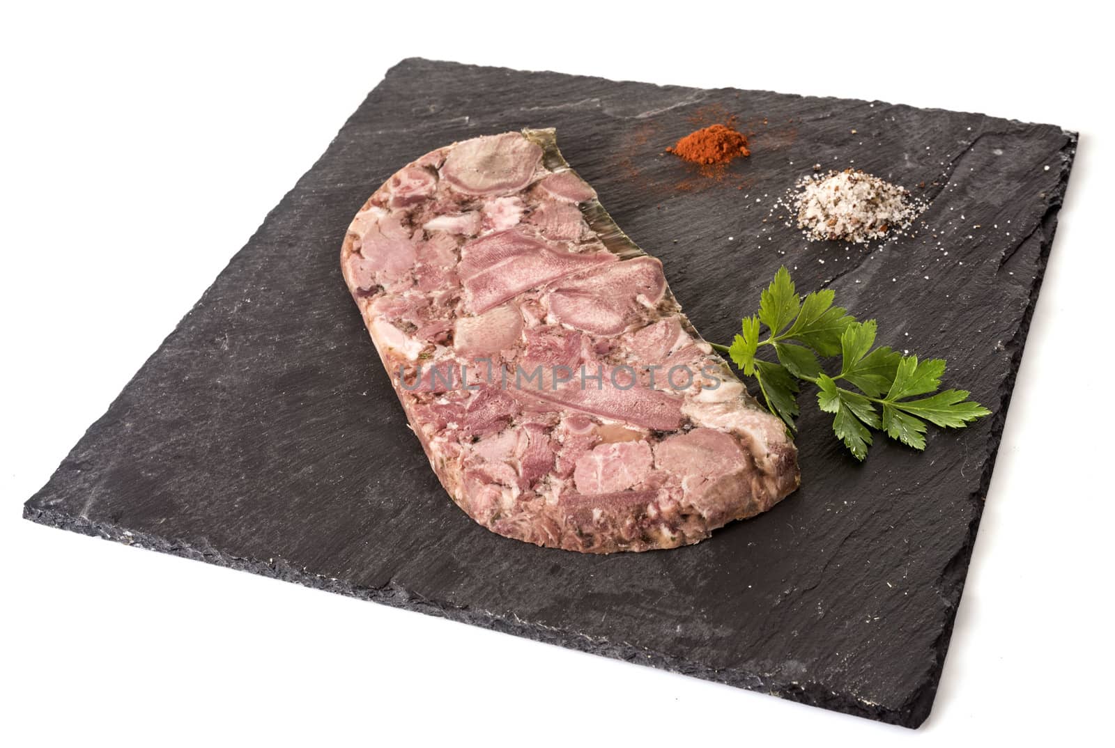 head cheese in front of white background 