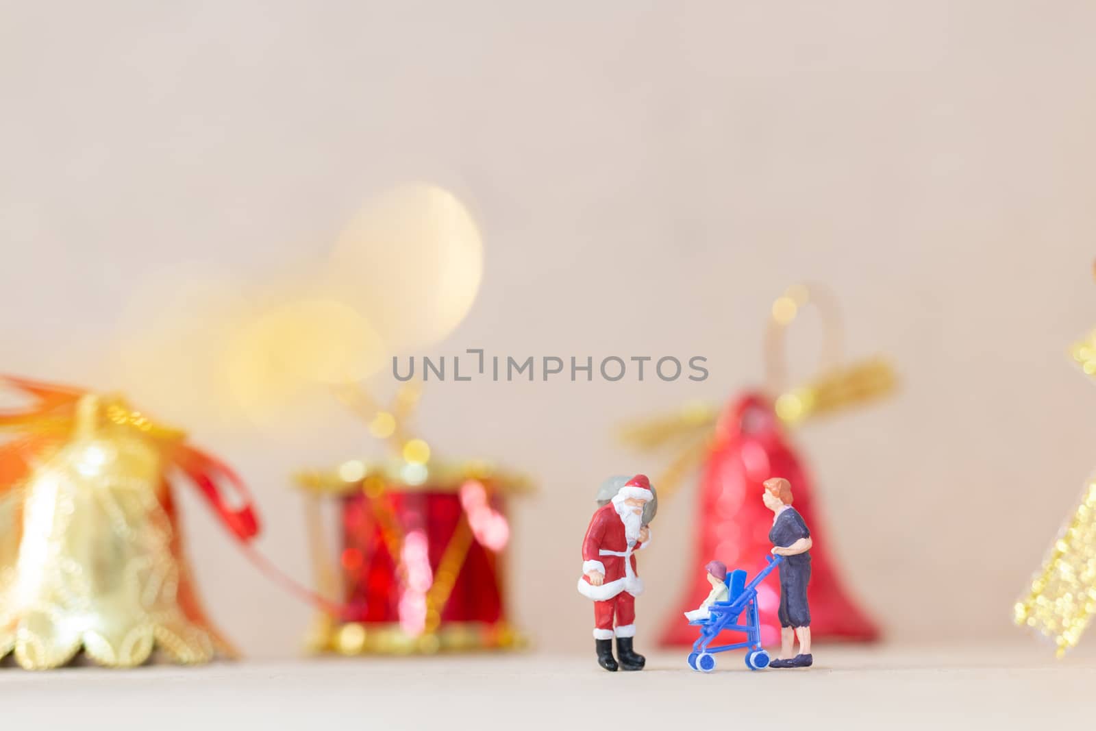 Miniature people, Happy family celebrating A Christmas by sirichaiyaymicro