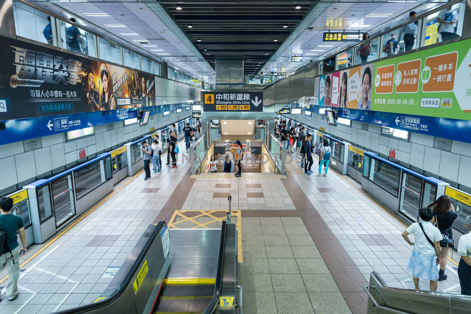 Passengers or commuters at rush hour in subway station in Taipei, Taiwan, long exposure photography for people movement, filter effect