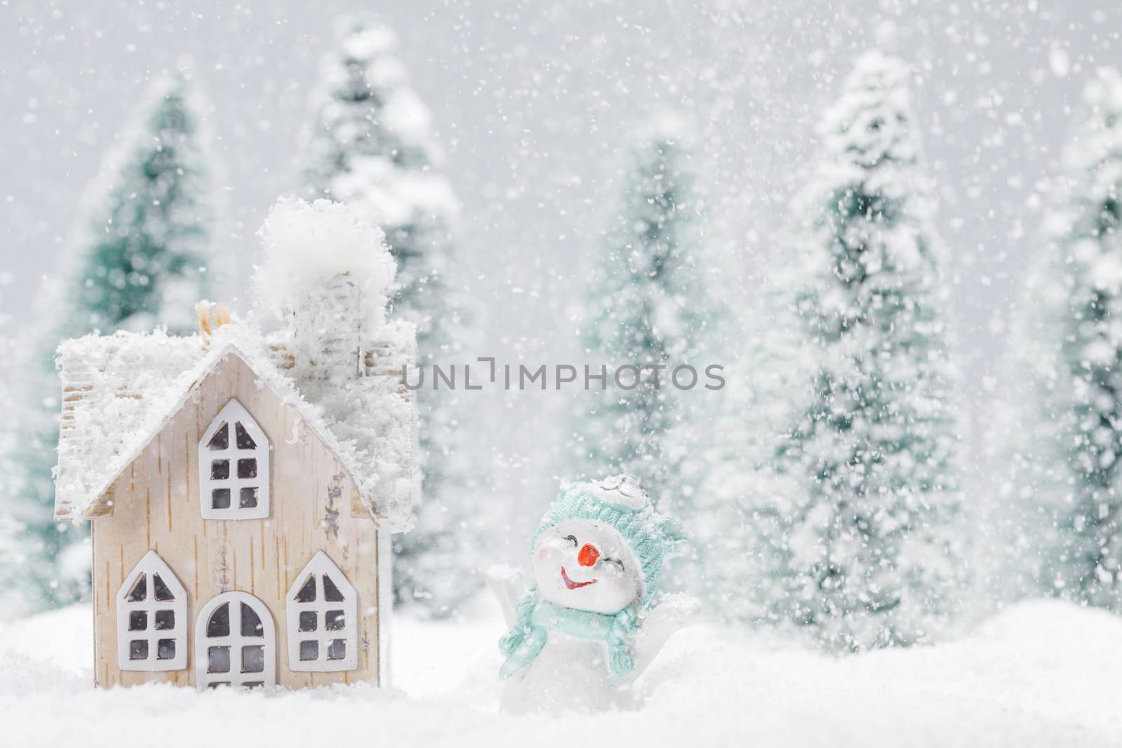 Snowman and house in winter by Yellowj