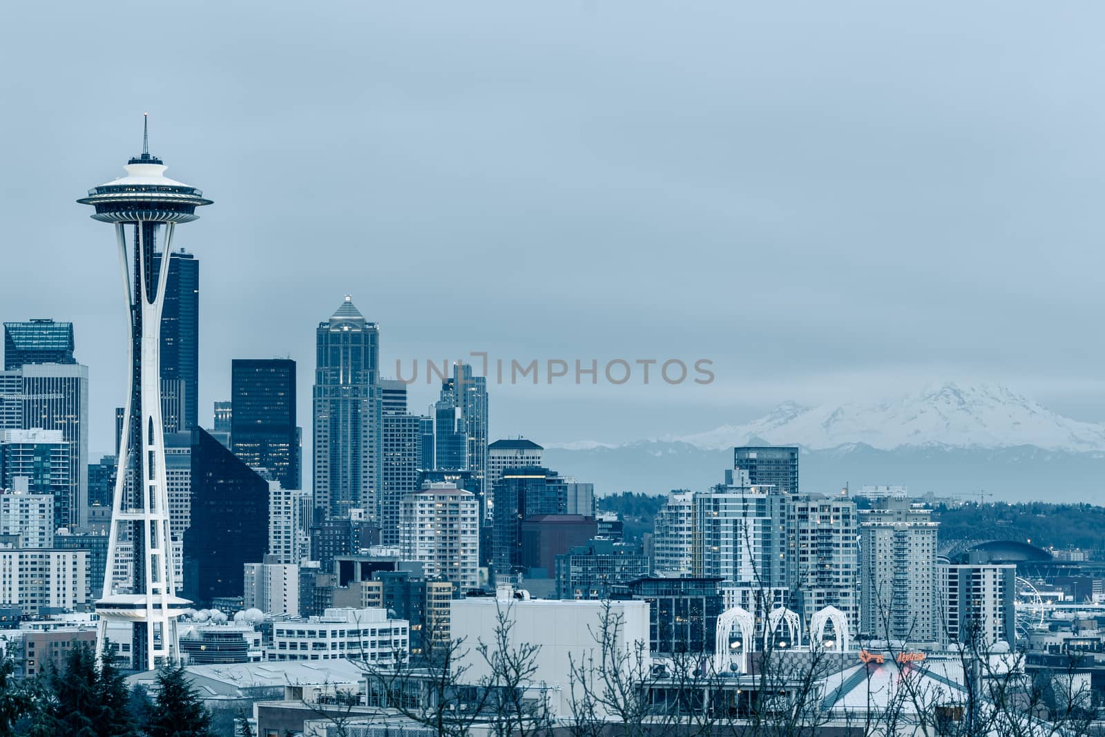 Seattle cityscape with Space Needle and Mount Rainier, view from Kerry Park. Seattle is a seaport city on the West Coast of the United States.