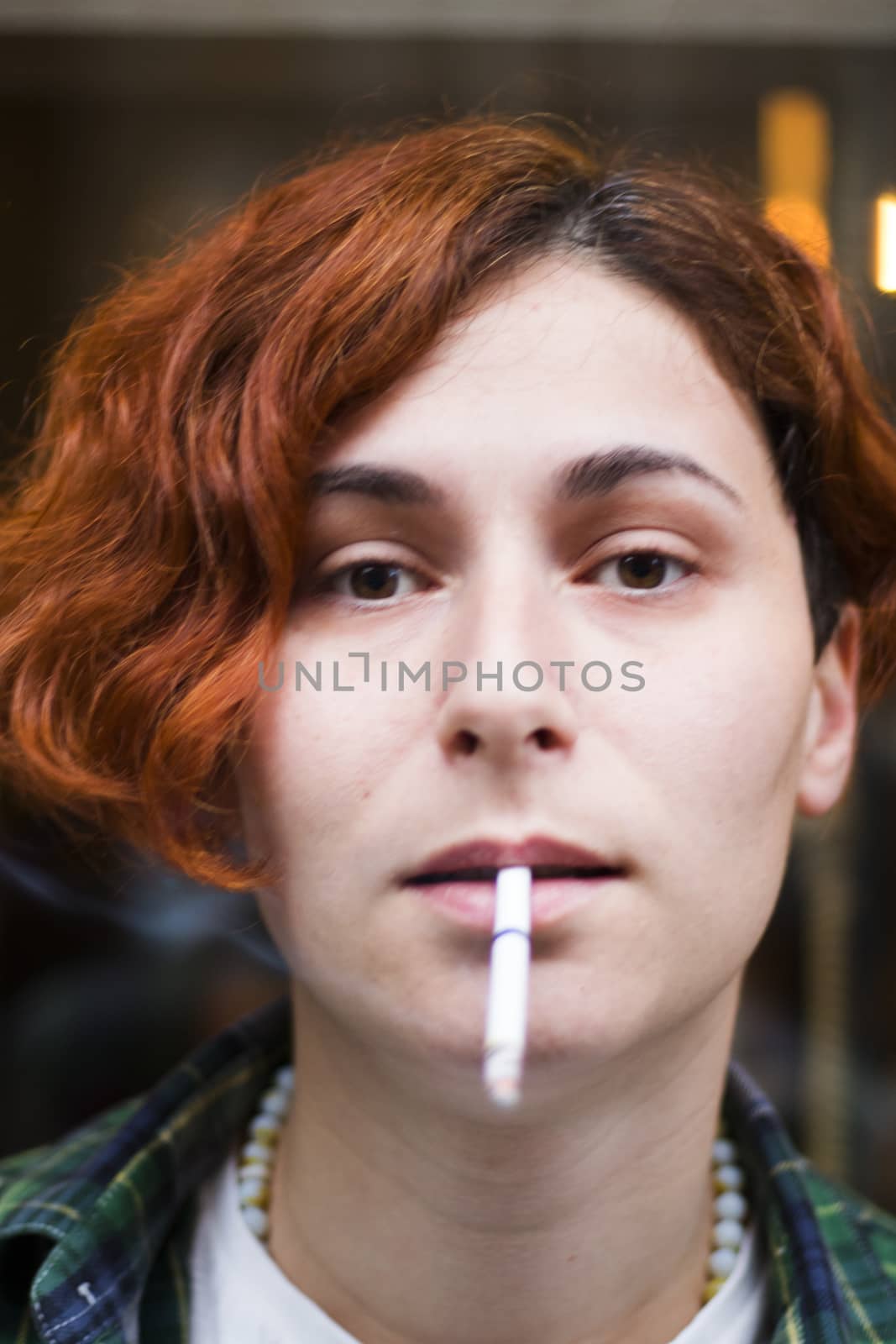 Woman portrait with cigarette, smoking scene. close-up portrait.