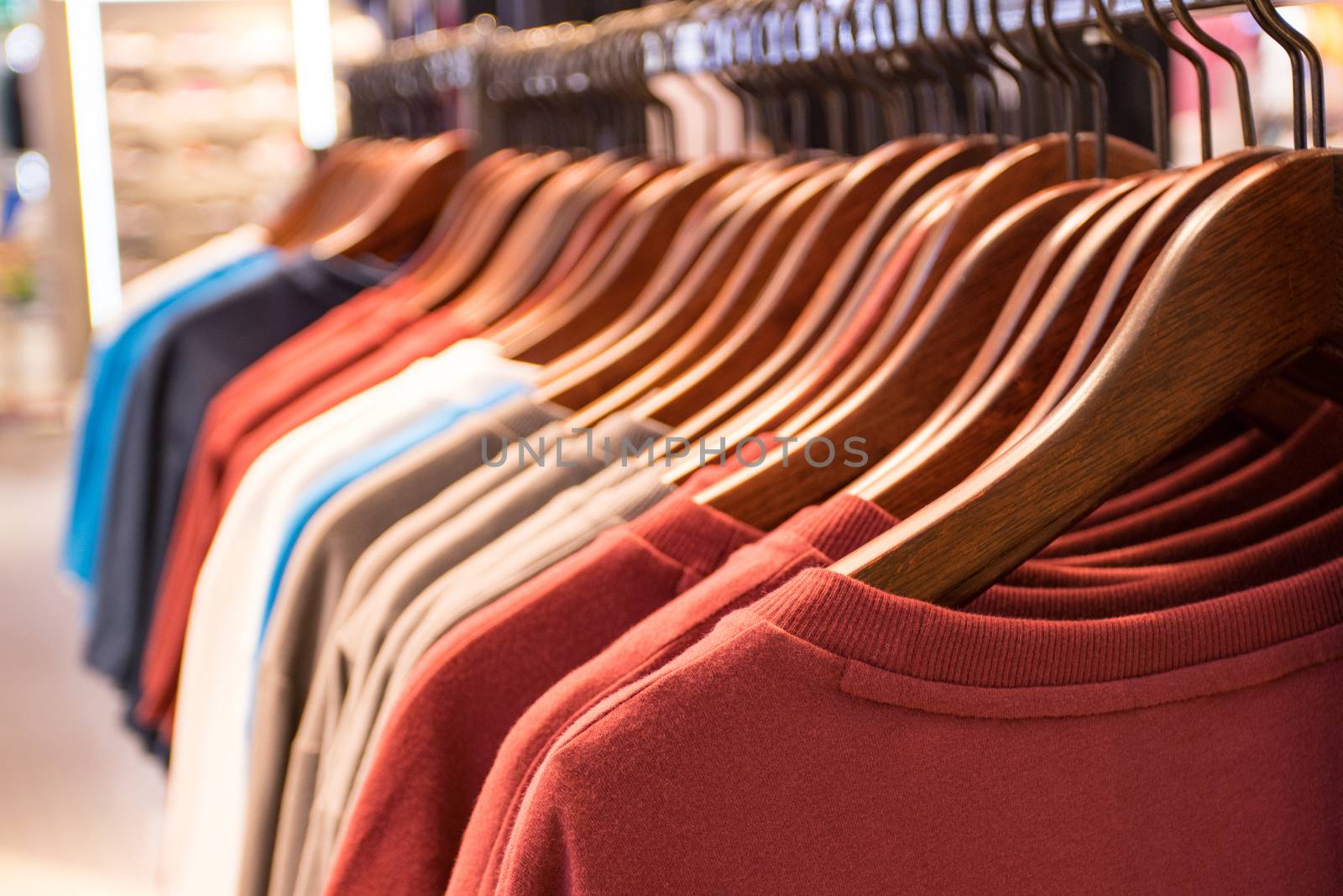 T-Shirt of man for sales on hangers at super market  Thailand  