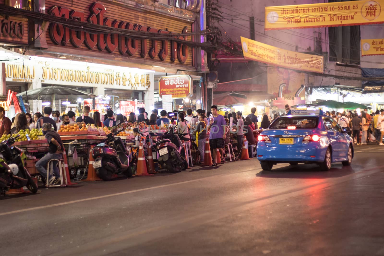 Bangkok Thailand - Oct 24, 2020 :- a lot of people, walking at Street food of Bangkok Some street vendors operate in groups the same place every night and have a different choice of meal