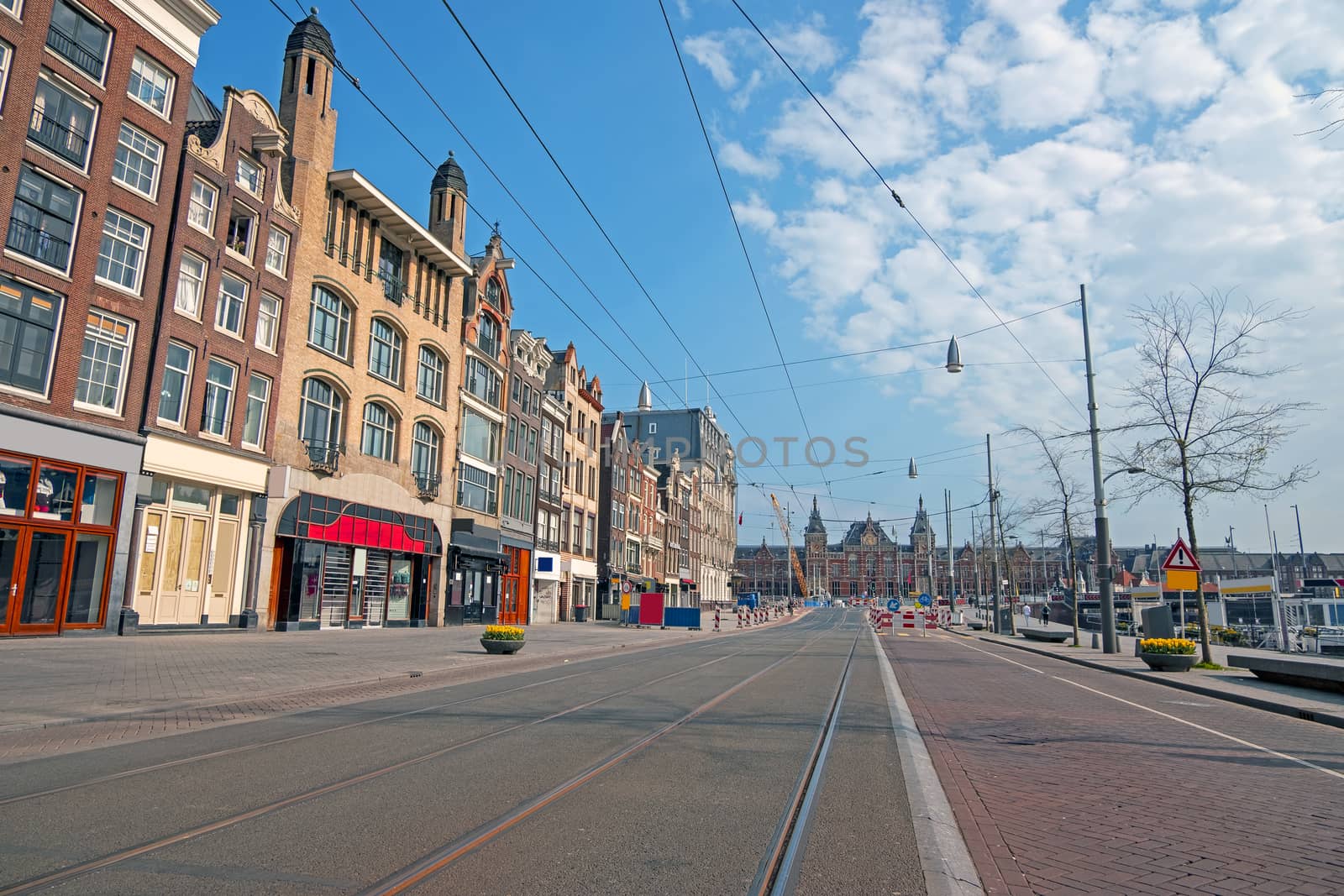 Empty Damrak during the Corona Crisis in Amsterdam the Netherlands